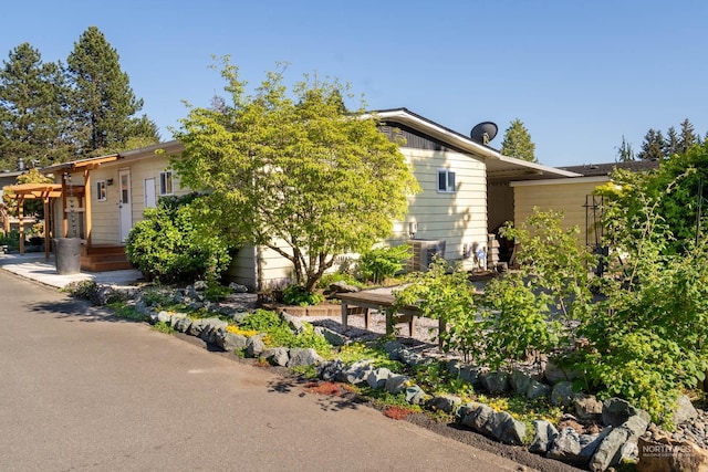 view of property hidden behind natural elements