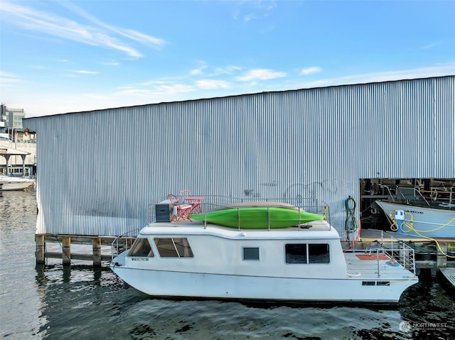 dock area with a water view