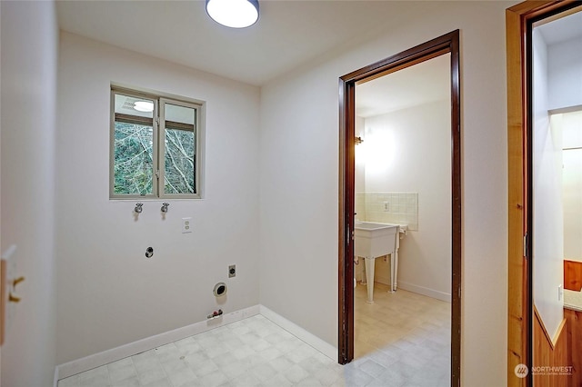 clothes washing area featuring hookup for a gas dryer, hookup for an electric dryer, and hookup for a washing machine