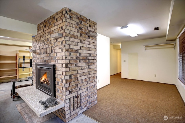 unfurnished living room with a brick fireplace