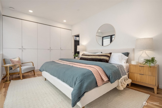 bedroom featuring light hardwood / wood-style flooring