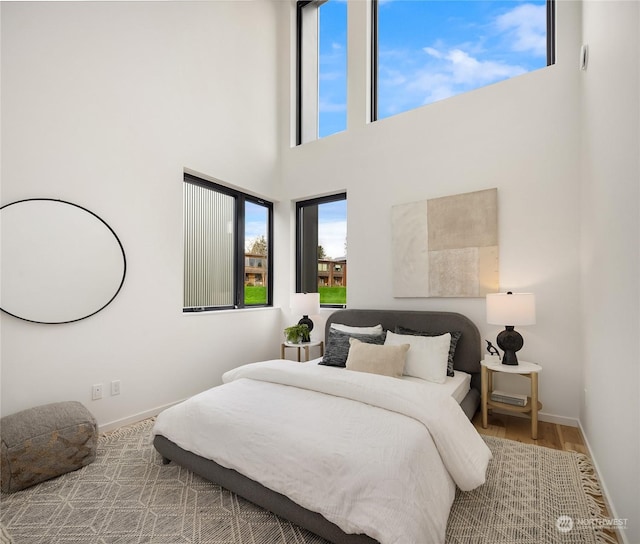 bedroom featuring wood-type flooring