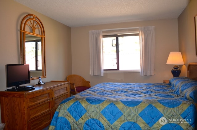 bedroom with a textured ceiling