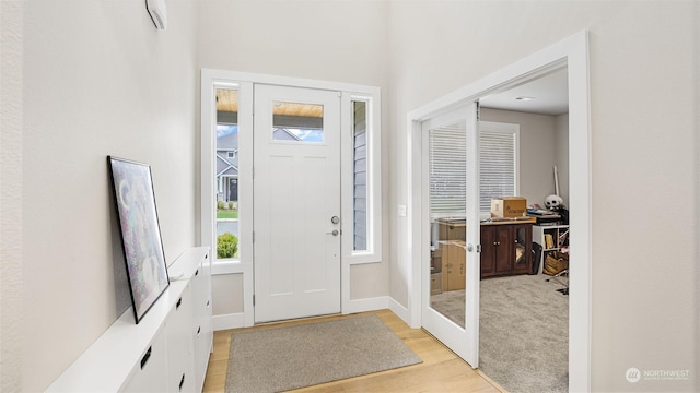 entrance foyer featuring light hardwood / wood-style floors