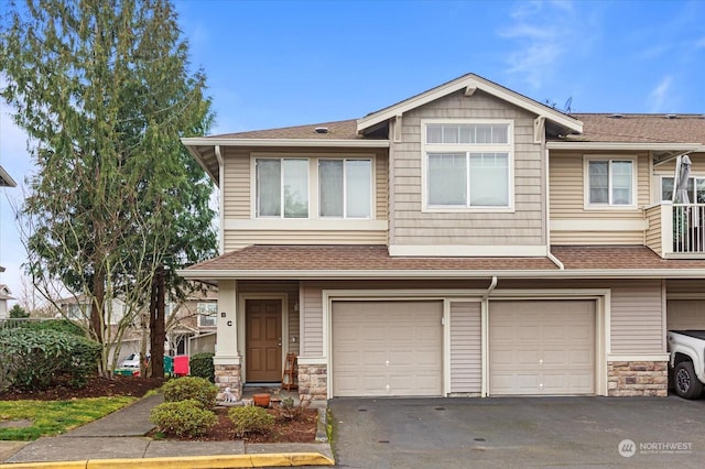 view of front of property with a garage