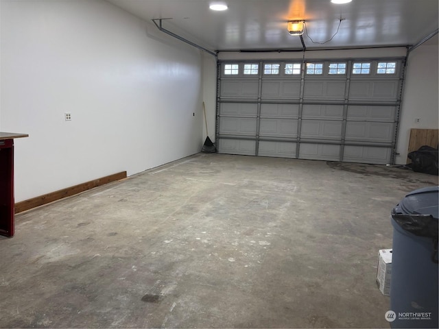 garage featuring a garage door opener