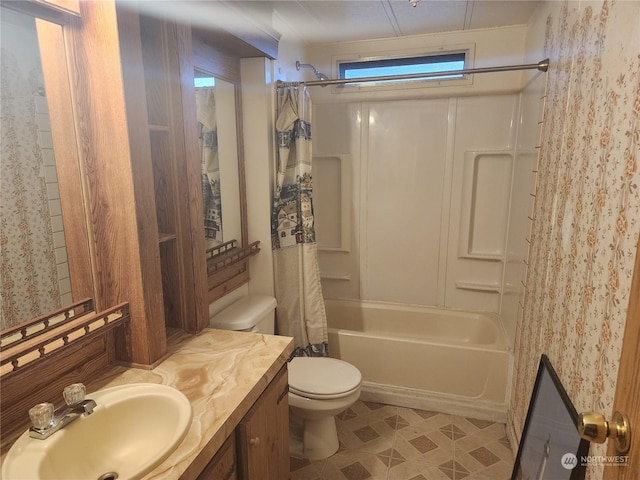 full bathroom with toilet, vanity, and shower / bath combination with curtain