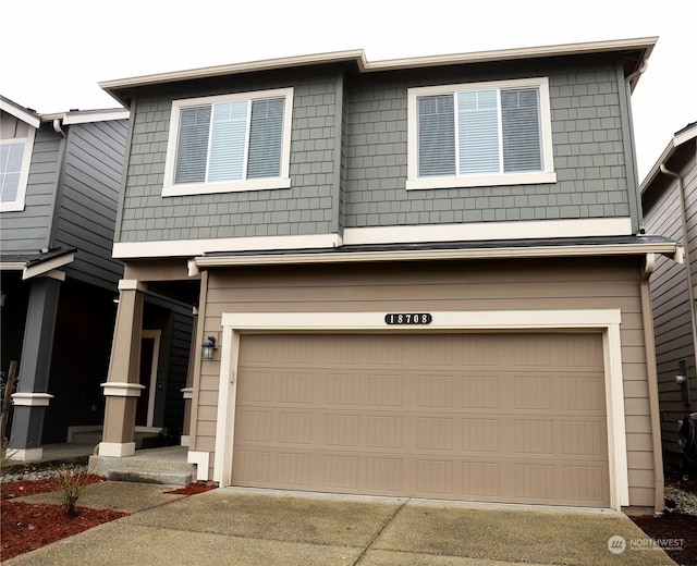 view of front of home with a garage