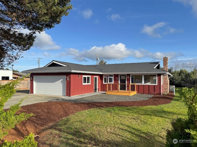 ranch-style house with a front lawn and a garage