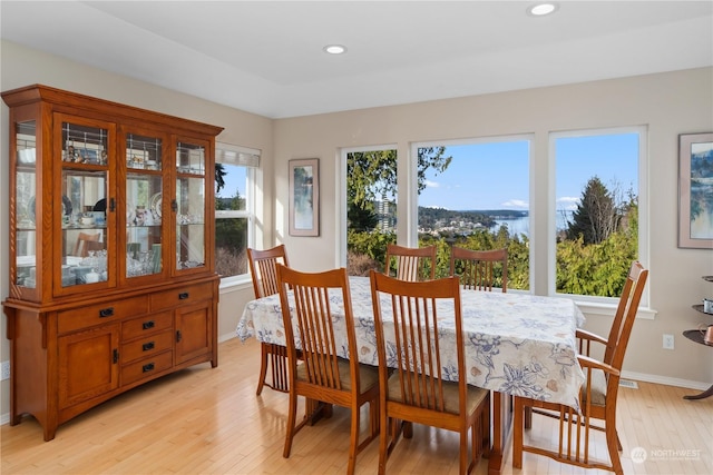 dining area with light wood-type flooring