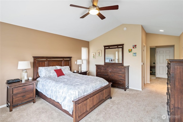 carpeted bedroom with vaulted ceiling and ceiling fan