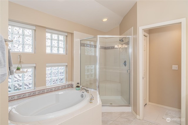 bathroom with tile patterned flooring, plus walk in shower, and lofted ceiling