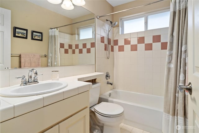 full bathroom with vanity, toilet, and shower / bath combo