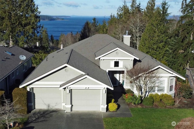 aerial view featuring a water view