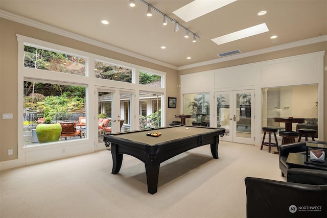 recreation room with light colored carpet, french doors, and pool table