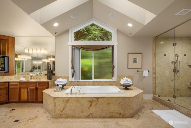 bathroom featuring high vaulted ceiling, vanity, and plus walk in shower