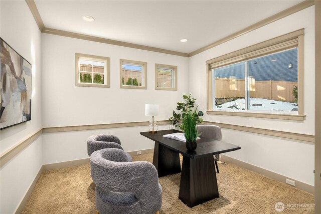 sitting room with recessed lighting, light carpet, crown molding, and baseboards