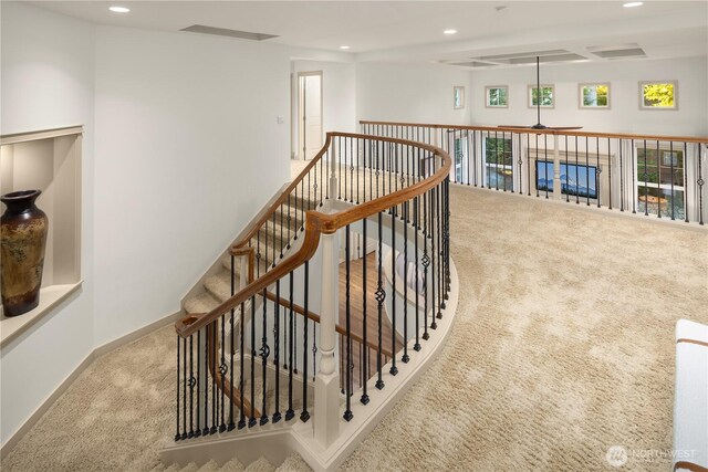 stairway with recessed lighting, carpet, a ceiling fan, and baseboards