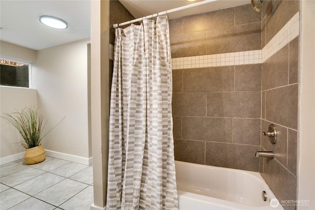 bathroom with tile patterned flooring, visible vents, shower / tub combo with curtain, and baseboards