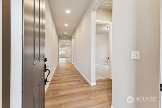 hall featuring light hardwood / wood-style flooring