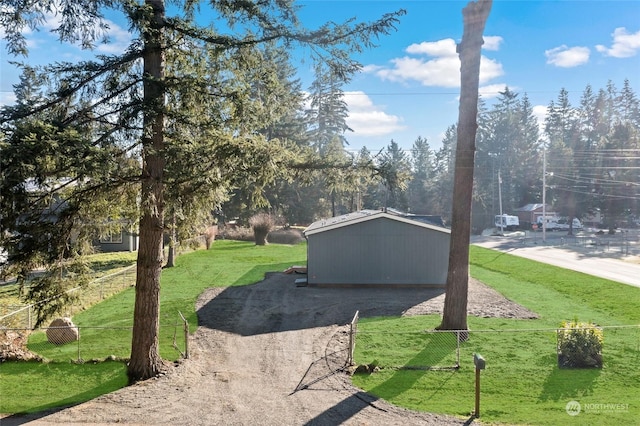 view of side of home with a lawn