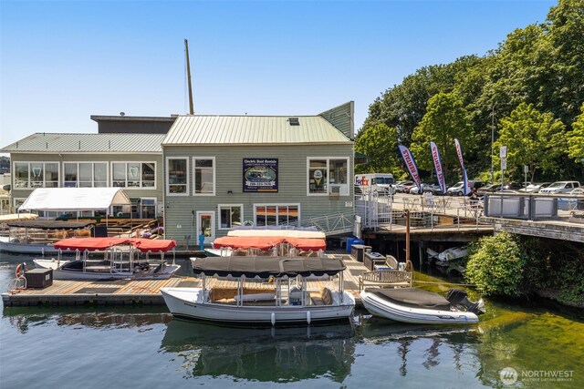 750 Crockett St Unit 403, Seattle, WA 98109 - back of property with a water view and a metal roof