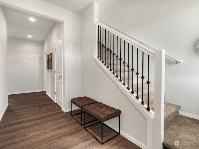 stairway with wood-type flooring