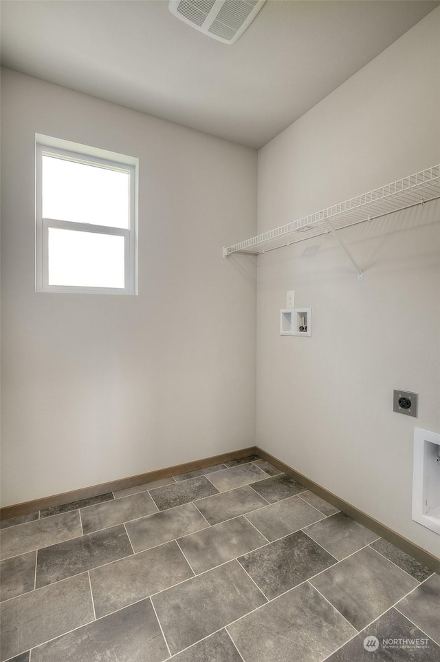 clothes washing area with hookup for a washing machine and hookup for an electric dryer