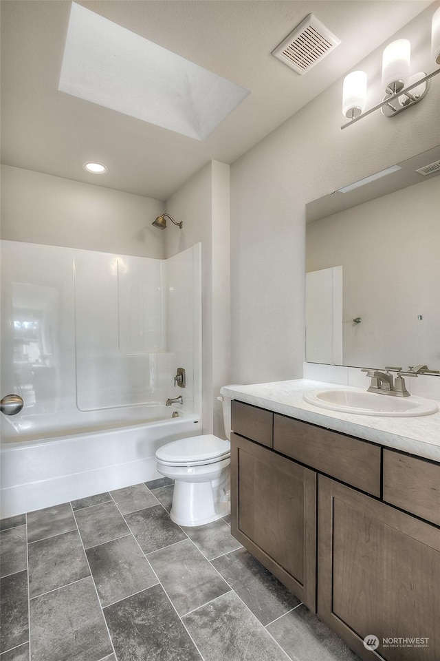 full bathroom with toilet, tub / shower combination, and vanity