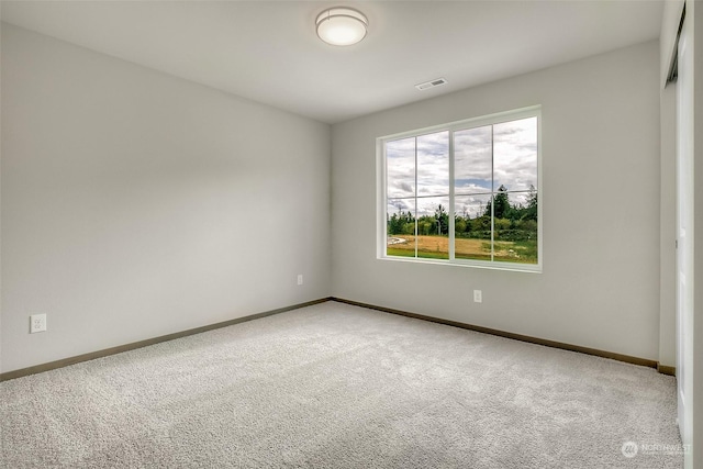 view of carpeted spare room