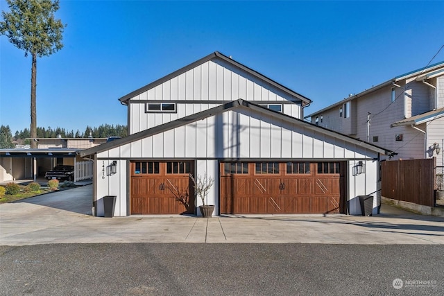 modern inspired farmhouse featuring a garage