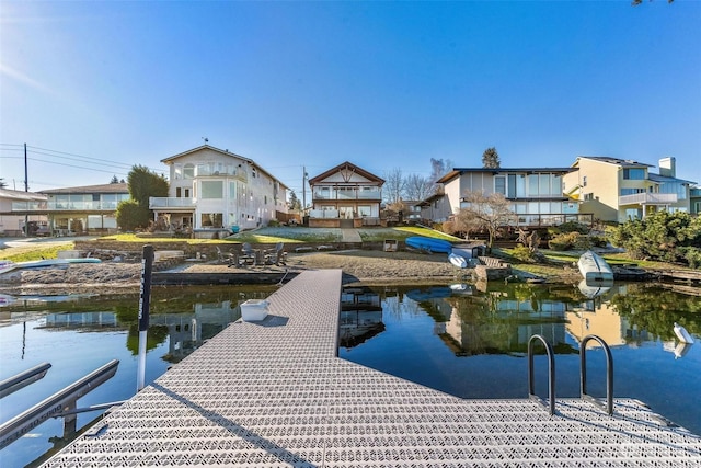 dock area with a water view