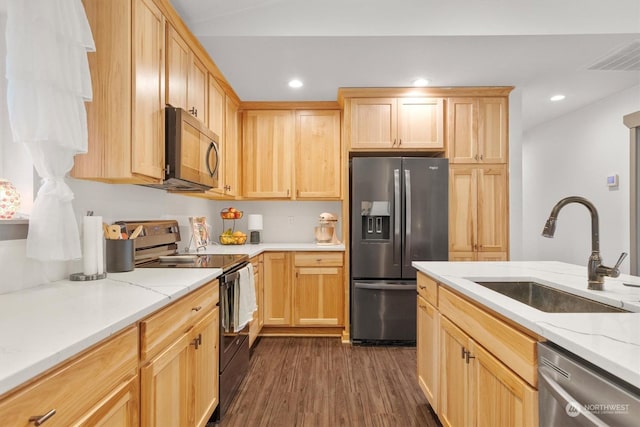 kitchen featuring light brown cabinetry, appliances with stainless steel finishes, sink, and dark hardwood / wood-style flooring