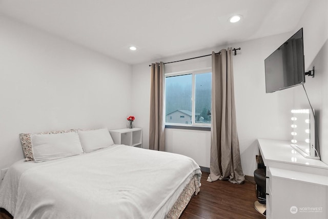 bedroom featuring dark wood-type flooring