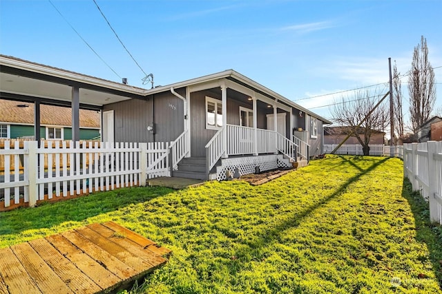 exterior space with covered porch and a front lawn