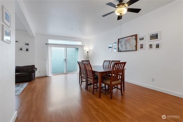 dining space featuring ceiling fan and light wood-type flooring