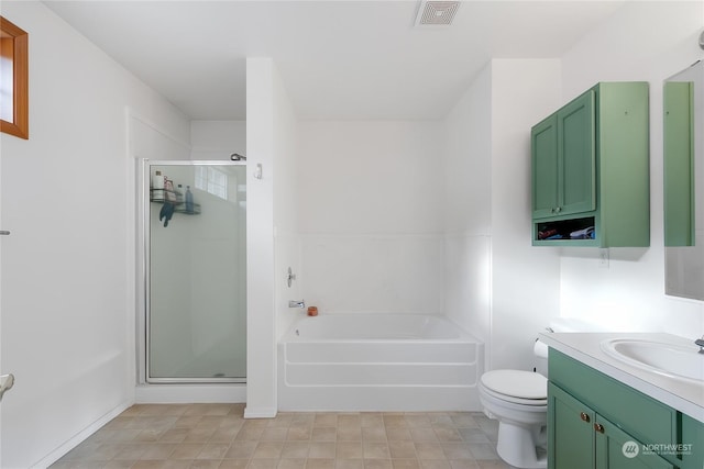 full bathroom with toilet, separate shower and tub, and vanity