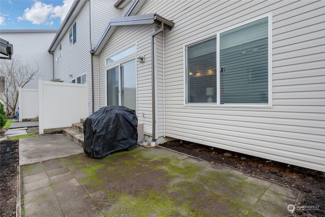 view of patio with a grill