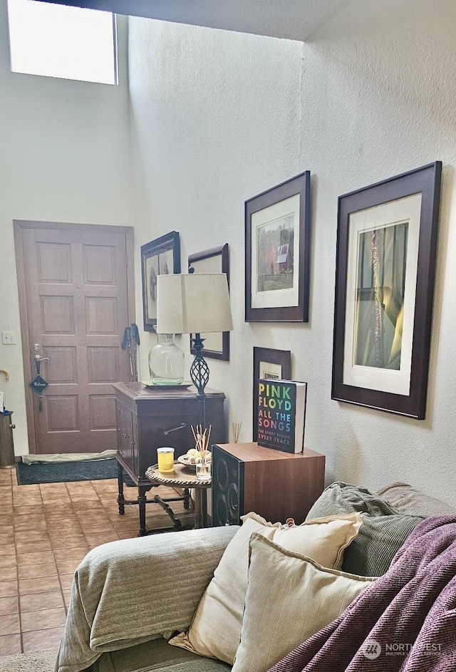 living room with tile patterned floors