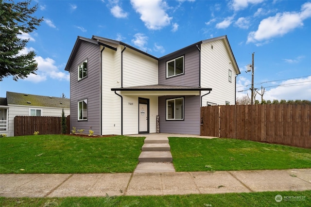 front facade featuring a front lawn