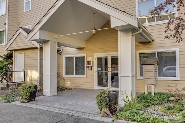 26291 Pennsylvania Ave NE Unit 106, Kingston, WA 98346 - view of exterior entry with a patio