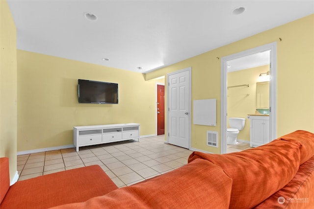 living room with light tile patterned floors