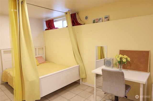 bedroom with tile patterned flooring