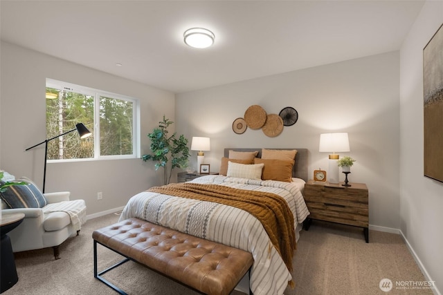 carpeted bedroom with baseboards