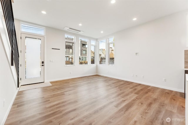 entryway with light hardwood / wood-style flooring