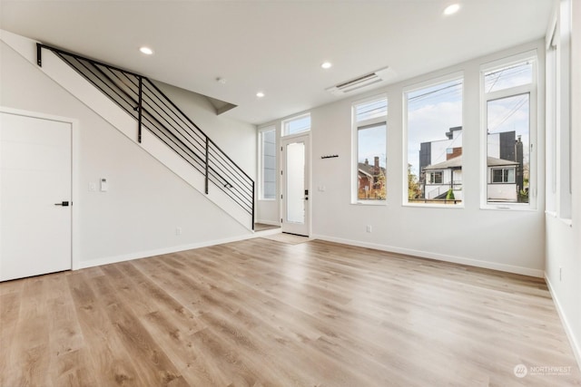 foyer with light wood-type flooring