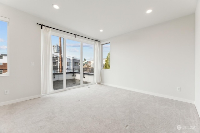 spare room featuring carpet floors