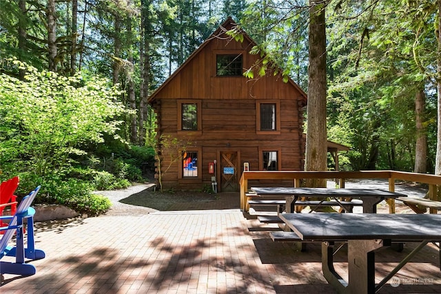 rear view of house with a patio