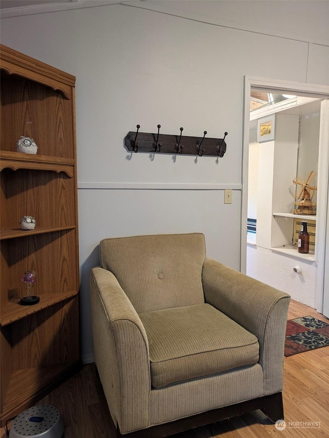 sitting room featuring wood-type flooring