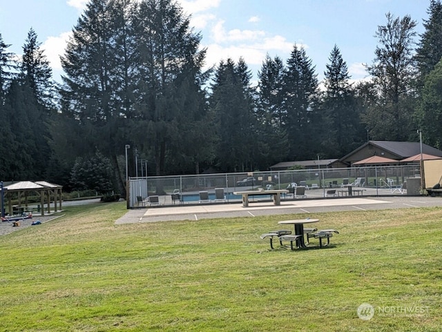 view of community with a lawn and a gazebo